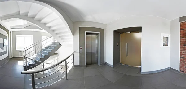 Interior staircases and lift in between, panorama.