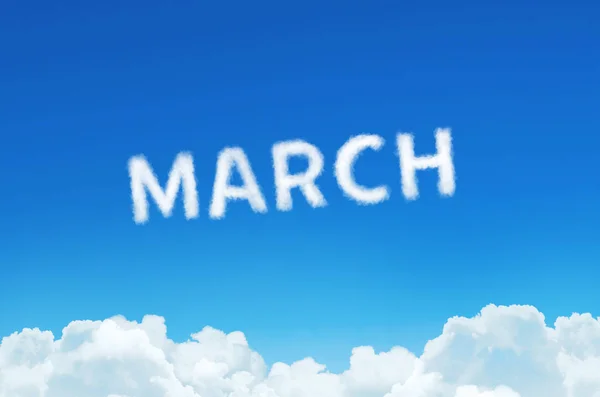 Slovo března z mračna páry na pozadí modré oblohy. Měsíce plánování, koncepce jízdního řádu. — Stock fotografie