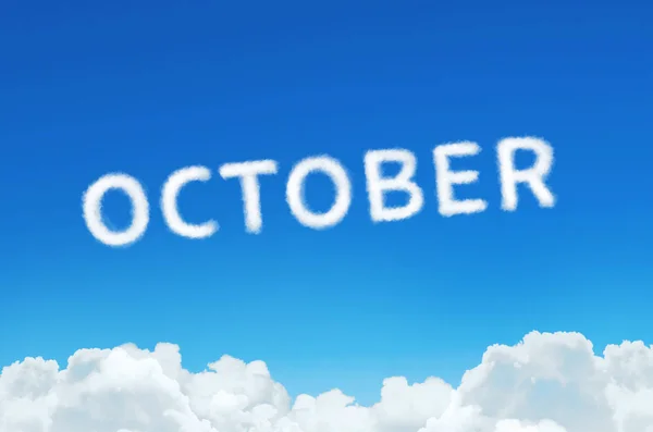 Word oktober gemaakt van wolken stoom op blauwe hemelachtergrond. Maand planning, tijdschema concept. — Stockfoto