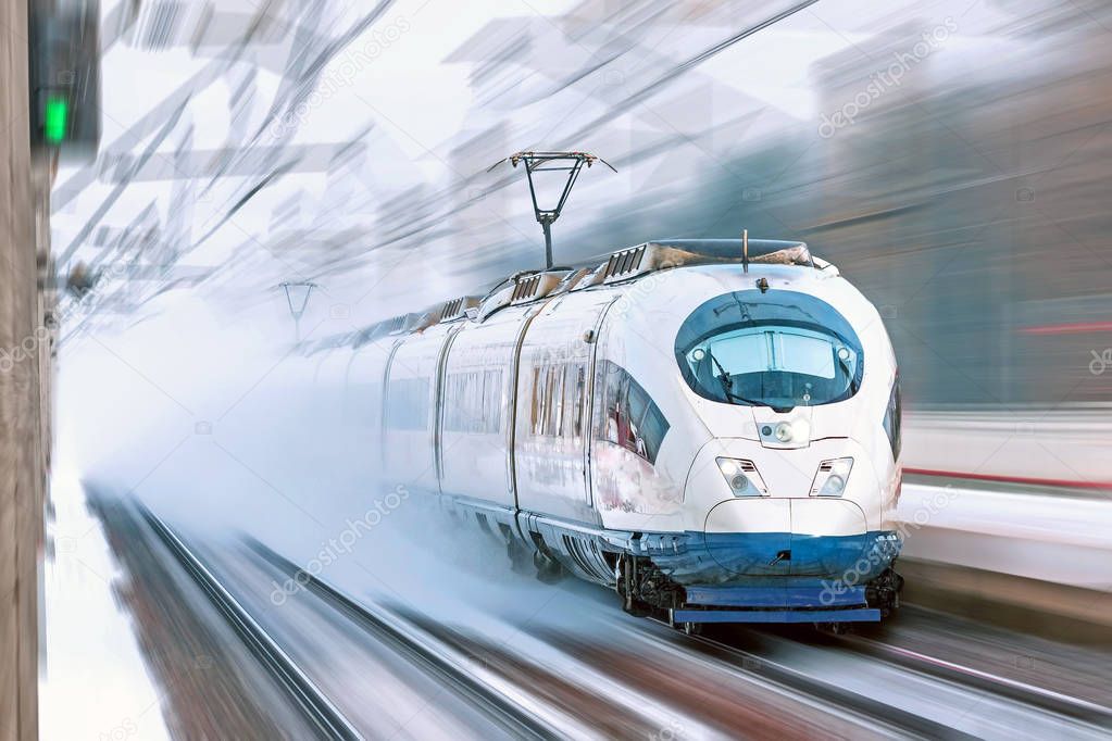 High speed train rides at high speed at the railway station in the city.