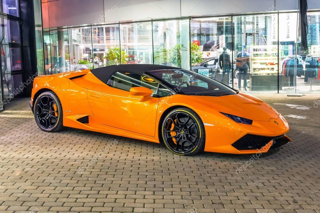Supercar Lamborghini Huracan orange color parked at the ...
