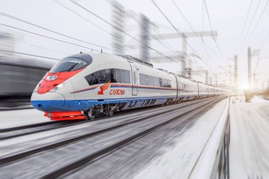 High-speed train Sapsan rides on the route Moscow-St. Petersburg. January 2018. clipart
