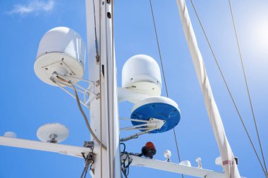 Navigation antennas and equipment on the mast of a marine yacht clipart
