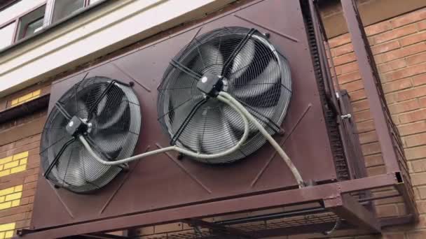External rotary fans for the air conditioning system outside the building — Stock Footage External Rotary Fans Air Conditioning System Building Stock Footage