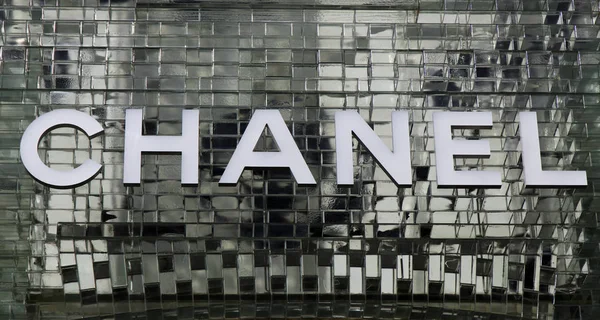 Letters chanel on a glass wall in amsterdam — Stock Photo, Image