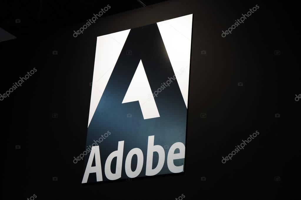 Amsterdam, Netherlands -september 15, 2017: Adobe logo and letters on a black wall