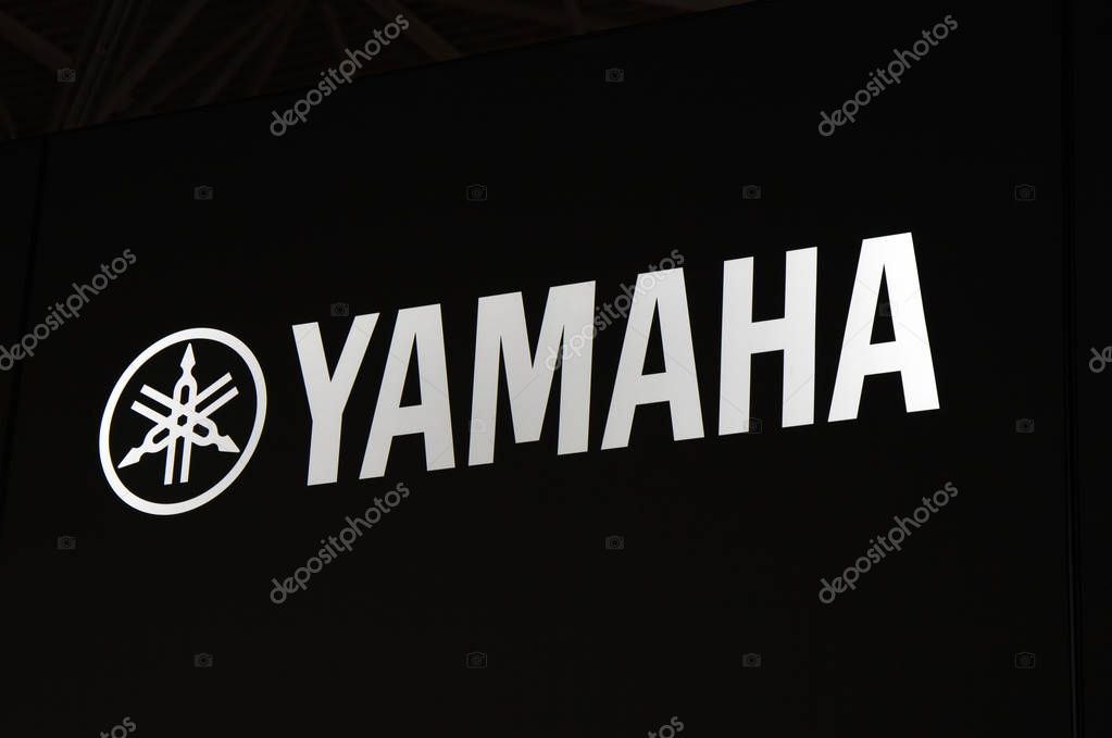 Amsterdam, Netherlands -september 15, 2017: Yamaha logo and letters on a black wall