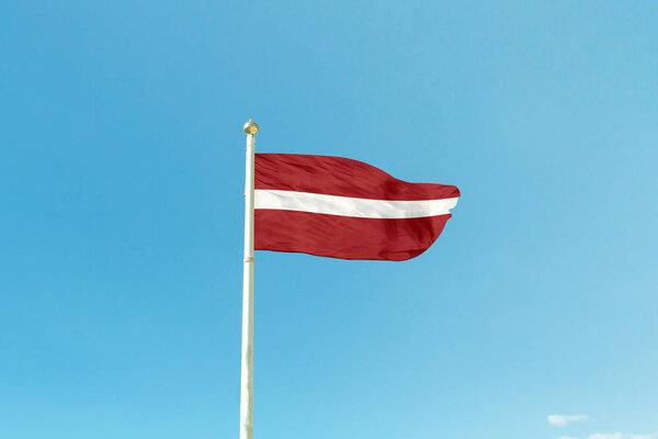 Flag of Latvia on the mast 