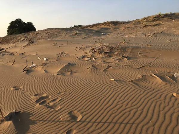 Garbage on sandy beach