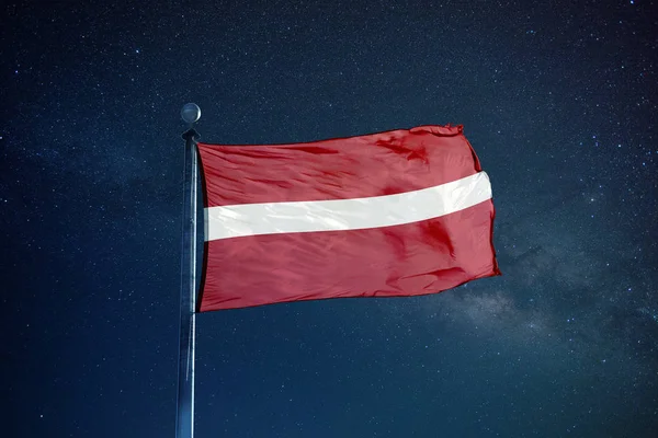 Lettisk flag på masten - Stock-foto