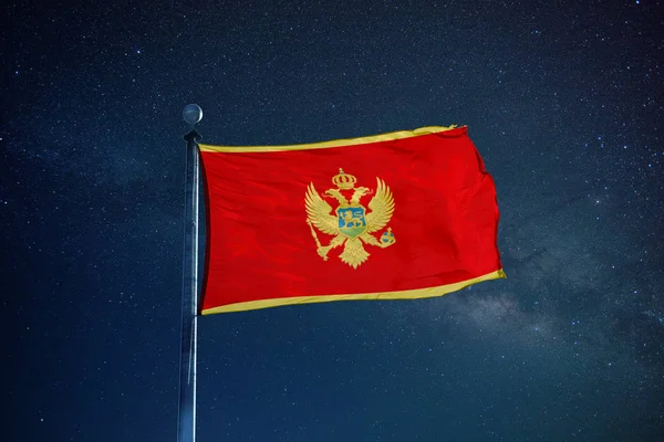 Montenegro flag on the mast — Stock Photo, Image