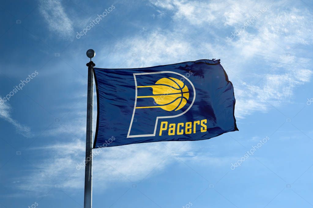 INDIANA - October 24, 2017 - Waving flag on the mast with Indiana Pacers NBA basketball team logo, United States.
