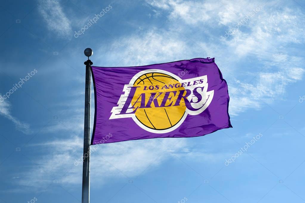 LOS ANGELES - October 24, 2017 - Waving flag on the mast with Los Angeles Lakers NBA basketball team logo, United States.