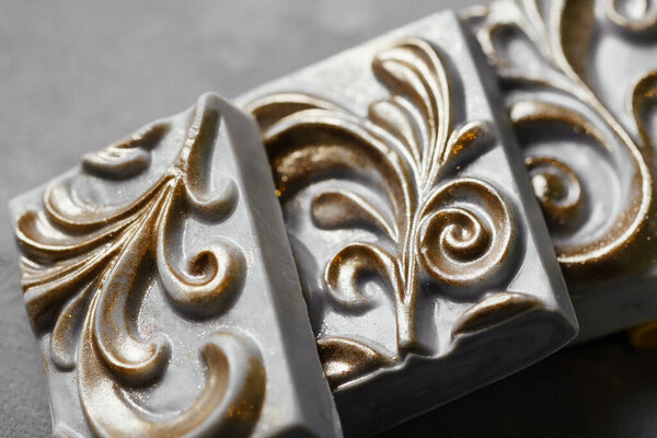 handmade soap in the form of a plaster cast with carved ornament. Huge bar of soap