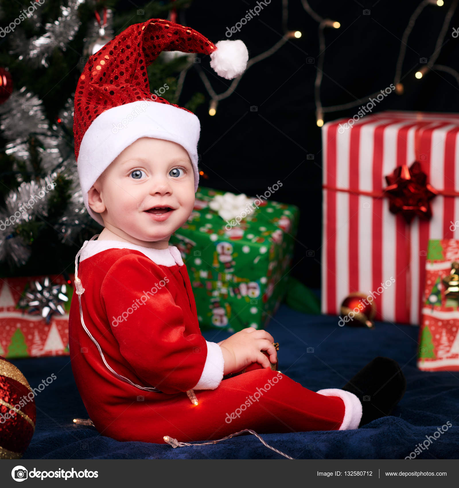 baby in santa outfit