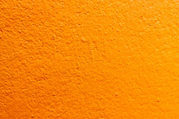 Die Textur der orangen Betonwand — Stockfoto