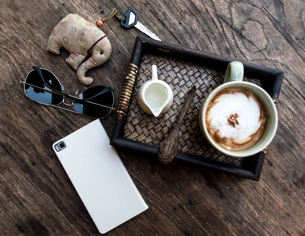 Flat lay out photography of wooden table at coffee shop. On the — Stock Photo, Image