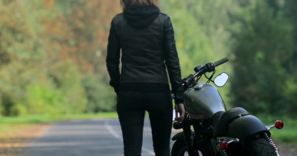 girl on back of motorcycle