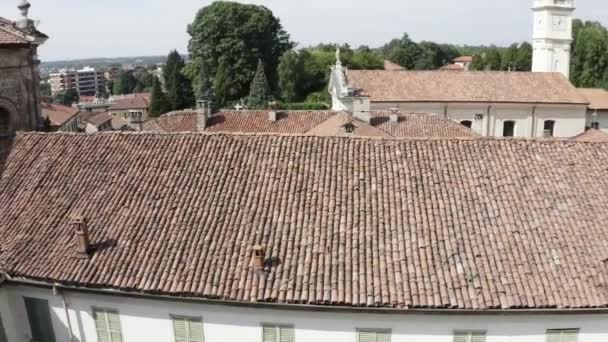 Aerial top view of red tiles roof in local European town on sunny summer day. — Stock Video