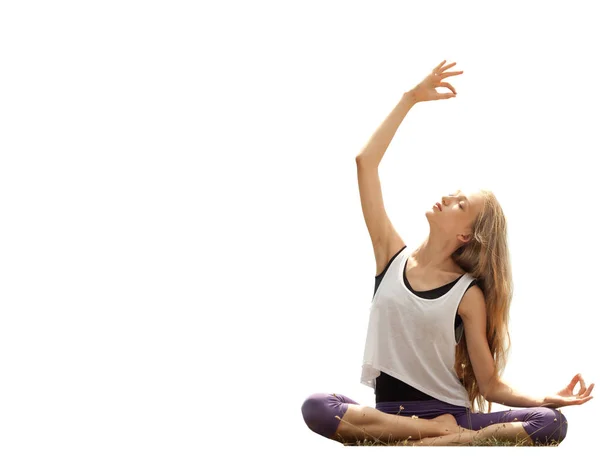 Adolescente haciendo yoga sobre un fondo blanco — Foto de Stock