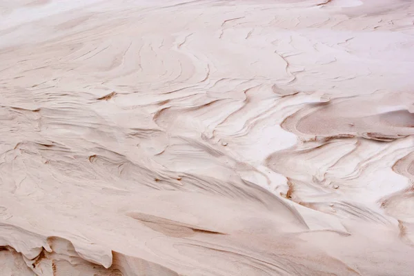 Fondo: dunas, olas de arena infladas por el viento Imagen De Stock