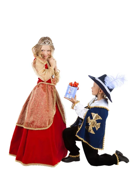 Little Musketeer gives a Gift to the Lady of the Heart — Stock Photo, Image