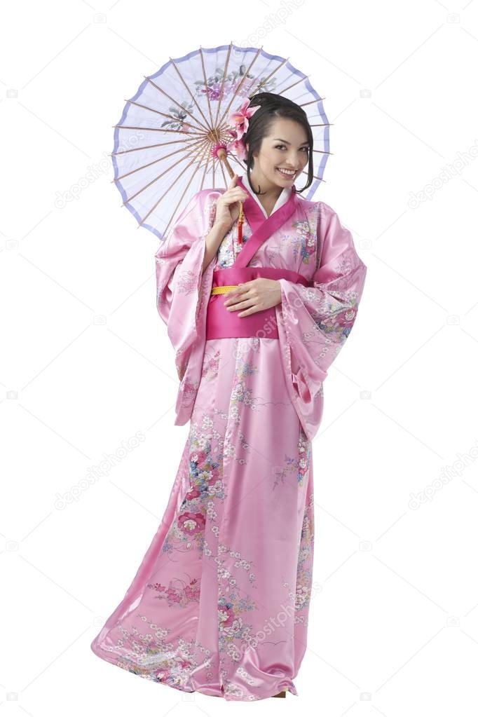 Young Woman in Kimono Dress with Umbrella