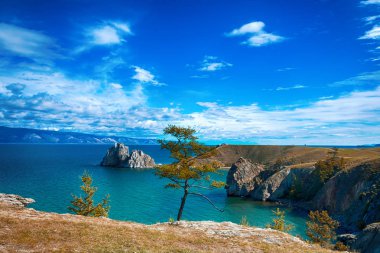 Shamanka Rock, Island Olkhon on the Lake Baikal clipart