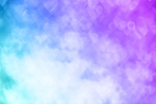 Blau und lila funkelnde defokussierte Lichter der Herzen Hintergrund — Stockfoto