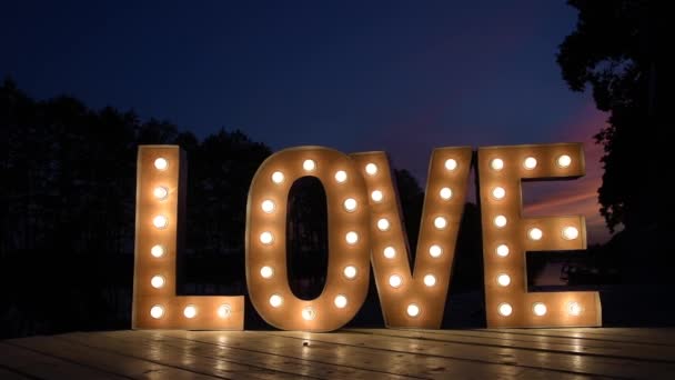 Inscrição Amor Luzes Fundo Movendo Lentamente Sentindo — Vídeo de Stock
