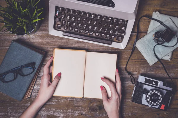 Female Hands Holding Empty Notebook — Stock Photo, Image