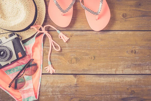 Beach accessories on an old yellow wooden table — Stock Photo, Image