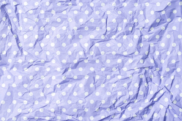Crumpled purple dotted background