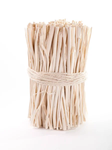 Група дерев'яних паличок, перев'язаних мотузкою — стокове фото