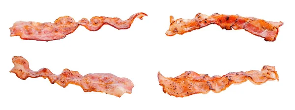 Quatro fatias de bacon frito em vários ângulos no fundo branco — Fotografia de Stock