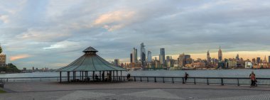 View to Manhattan skyline from Hoboken, Jersey city clipart