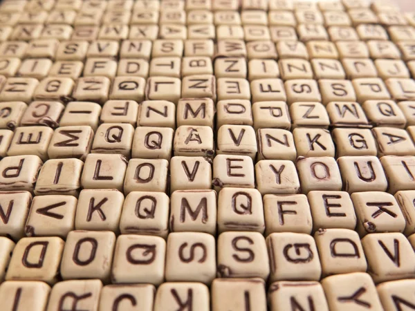 The inscription I LOVE YOU in the array of cubes with letters — Stock Photo, Image