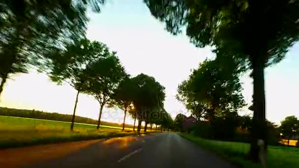Οδήγηση ενός αυτοκινήτου στο ηλιοβασίλεμα - Pov — Αρχείο Βίντεο