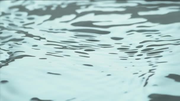 搅拌水表面飞溅和气泡在慢运动中上升 — 图库视频影像