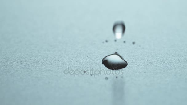 Drop Water Hits Surface Shatters Thousand Small Drops — Stock Video