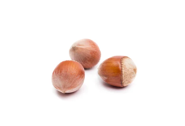 Three hazelnuts isolated on white, food background — Stock Photo, Image