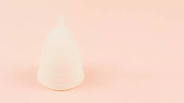 Close up of menstrual cup on pink background — Stock Photo, Image