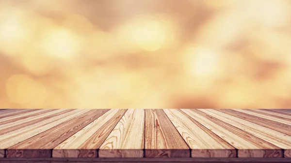Holz-Tischplatte auf unscharfem Bokeh-Hintergrund. — Stockfoto