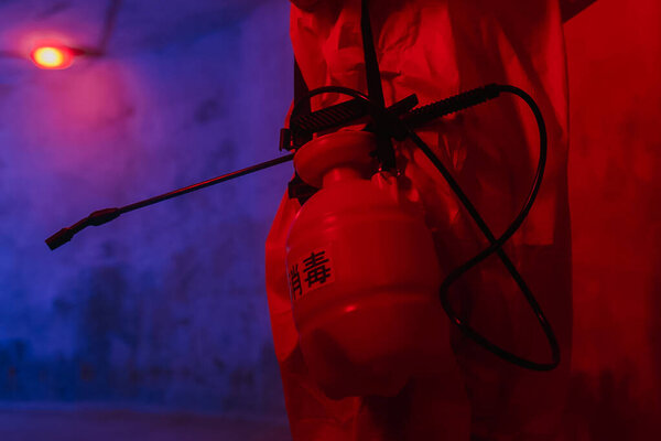 Sprayer is a yellow virologist's working tool for surface treatment