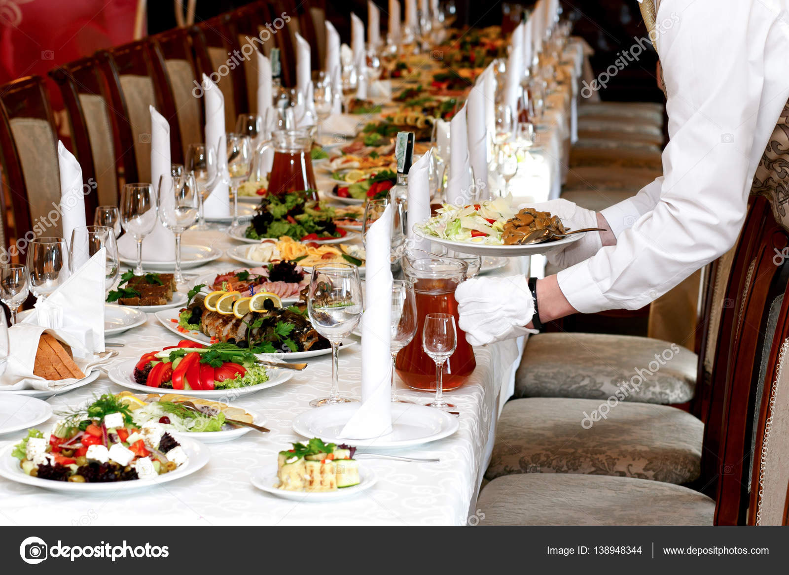 depositphotos_138948344 stock photo waiter serving food at luxury