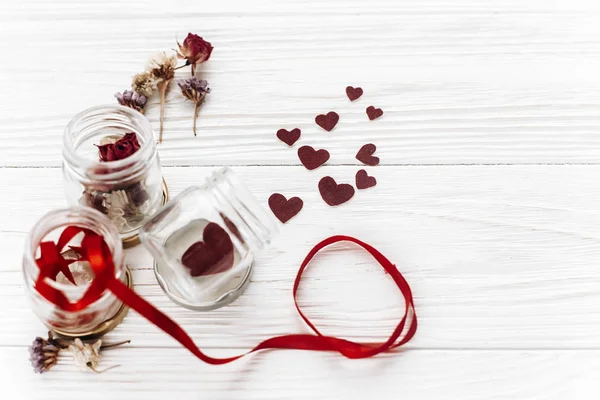 Stylish hearts in glass jar — Stock Photo, Image