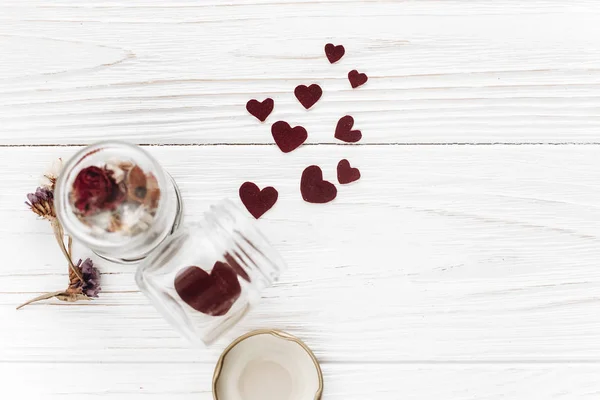 Stylish hearts in glass jar — Stock Photo, Image