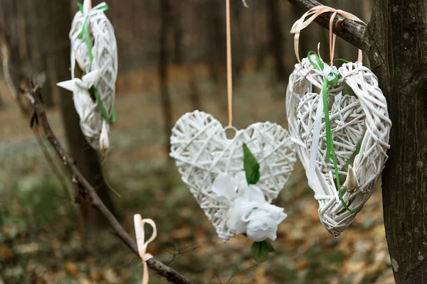 Stylish wicker heart in white rustic theme — Stock Photo, Image