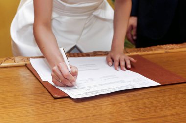  gorgeous bride signing register clipart
