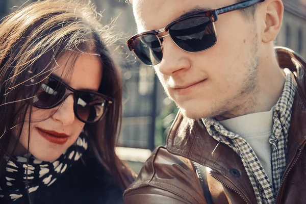 Stylish happy couple in sunglasses — Stock Photo, Image
